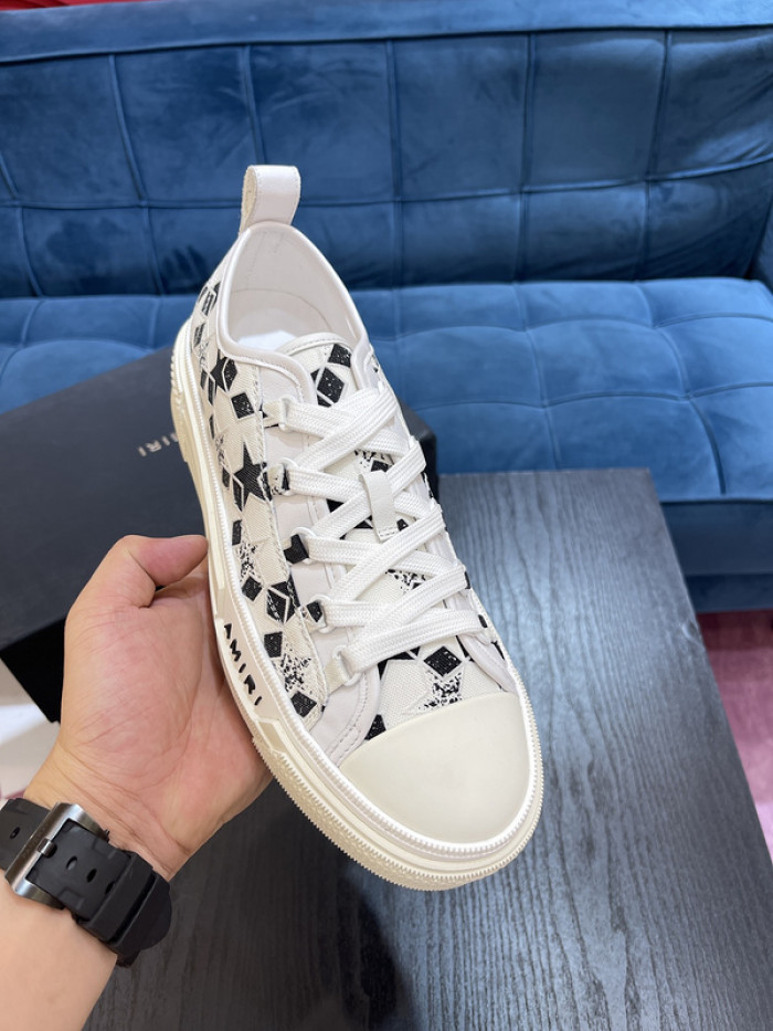 amiri* appliquéd leather and canvas sneakers