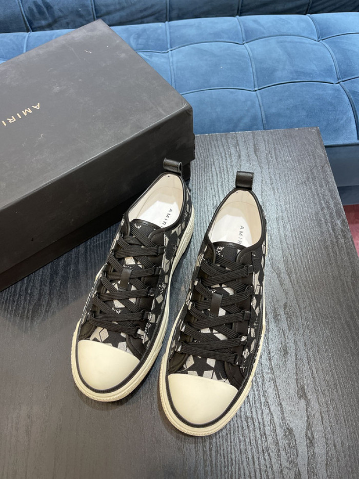 amiri* appliquéd leather and canvas sneakers