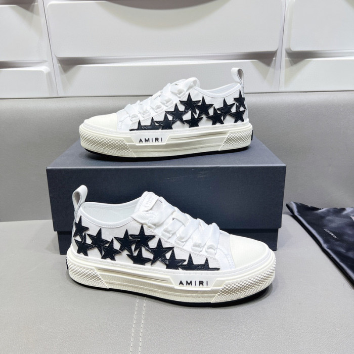 amiri* appliquéd leather and canvas sneakers