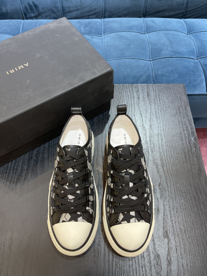 amiri* appliquéd leather and canvas sneakers